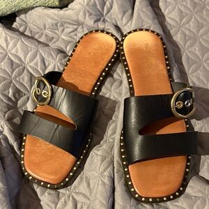 Coach and Four Aquila Black Sandals with adjustable straps gold buckle Accents